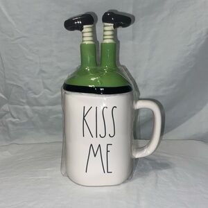 Rae Dunn “Kiss Me” mug withh leprechaun cover, so cute!